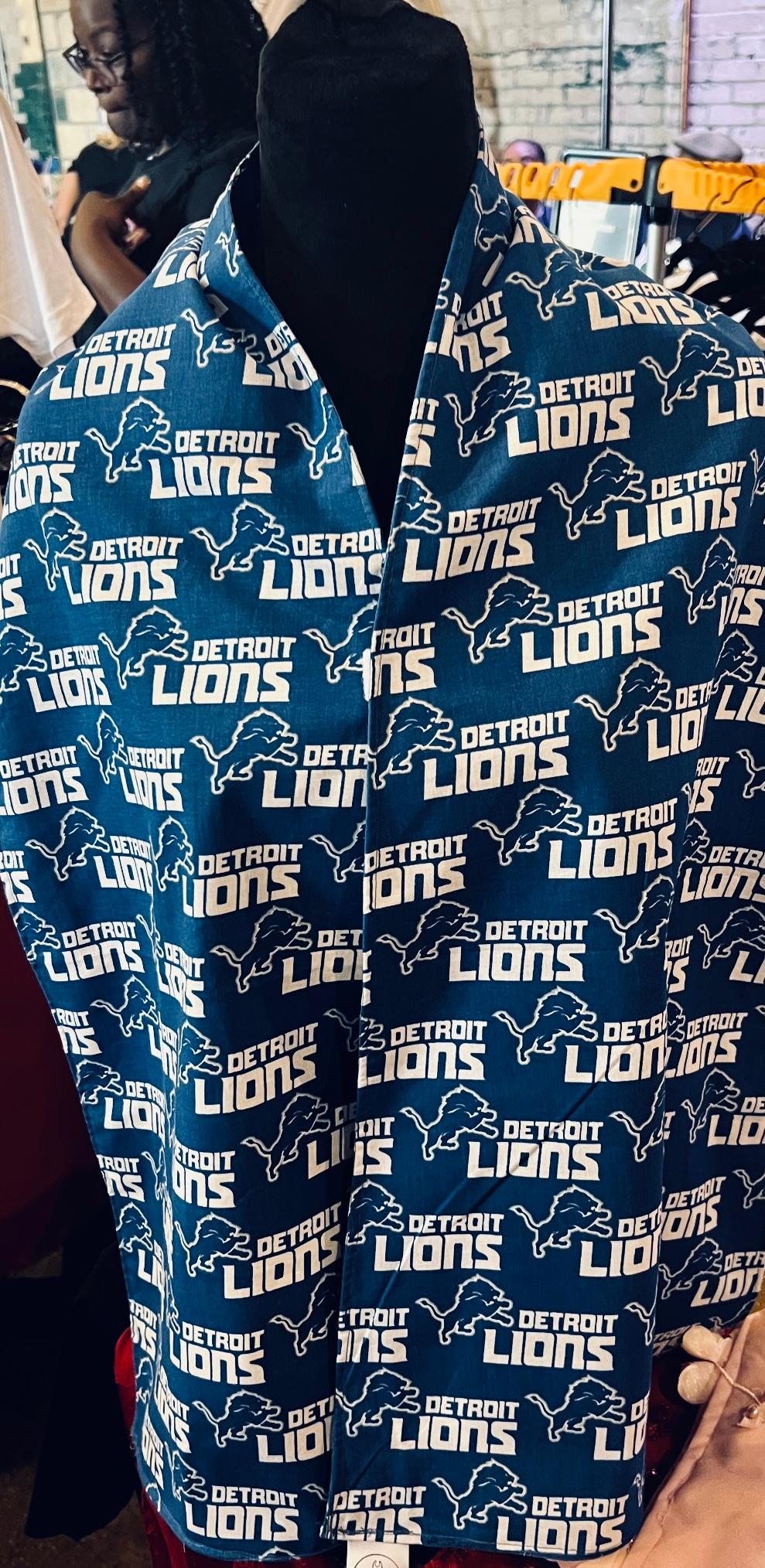 Custom, team pride NFL Football Detroit Lions on blue woven cotton fabric!